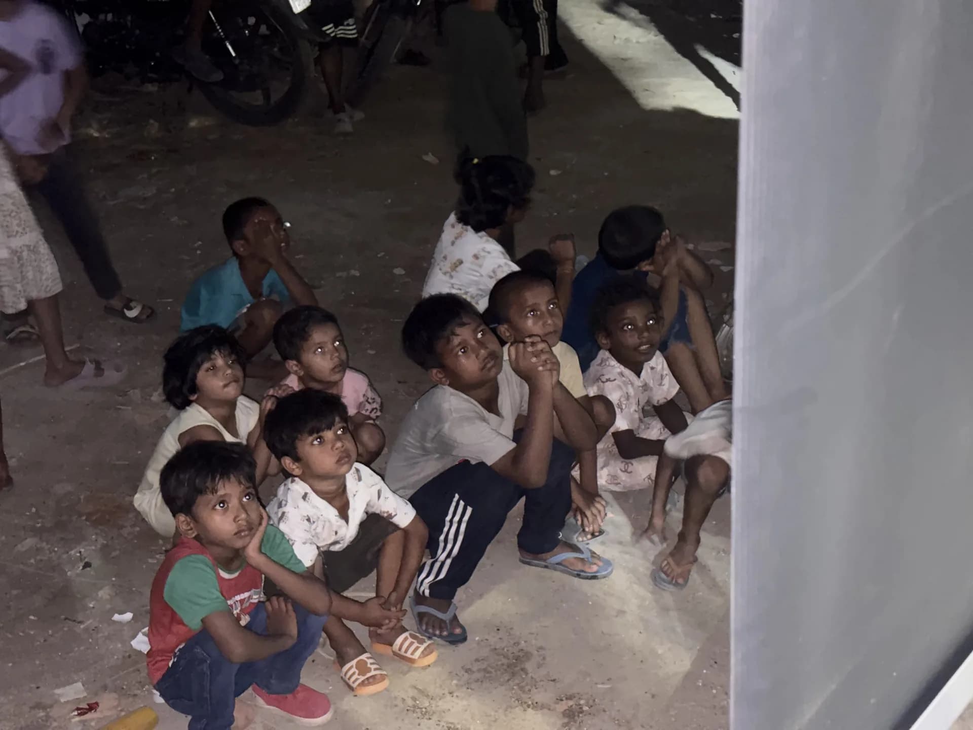 A quiet neighborhood street transformed into a cinema